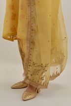 Yellow silk organza dupatta detailed with all-over light gold dori embroidery, highlighted with multi colored beads & gold sequins.