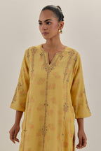 Yellow tissue chanderi straight kurta set with light gold dori embroidery, highlighted with multi color bead sequins work.