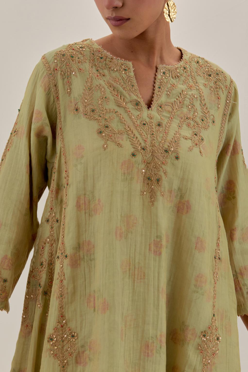 Green tissue chanderi easy fit short kalidar kurta set with light gold dori embroidery and hand block printed lining inside.