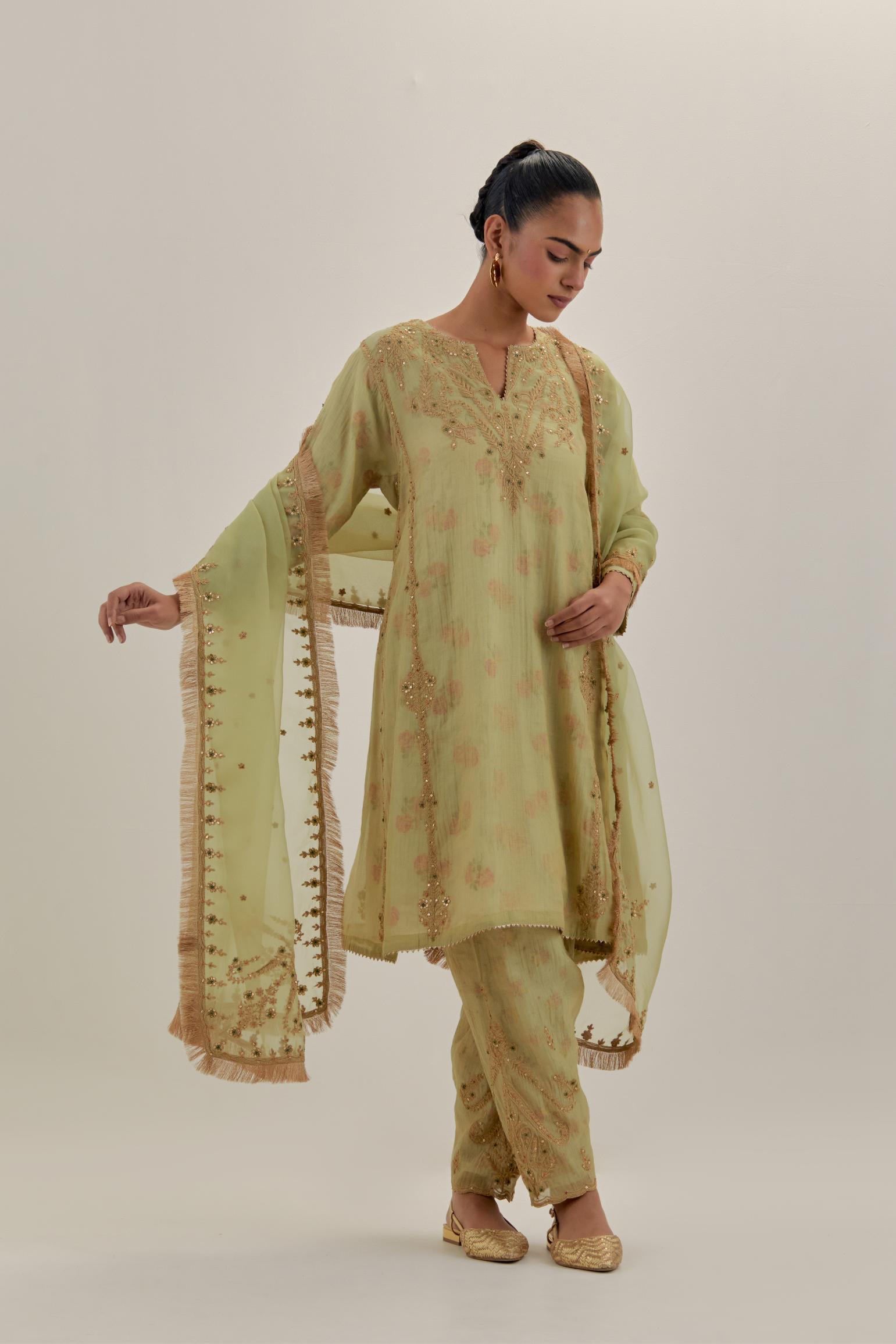 Green tissue chanderi easy fit short kalidar kurta set with light gold dori embroidery and hand block printed lining inside.