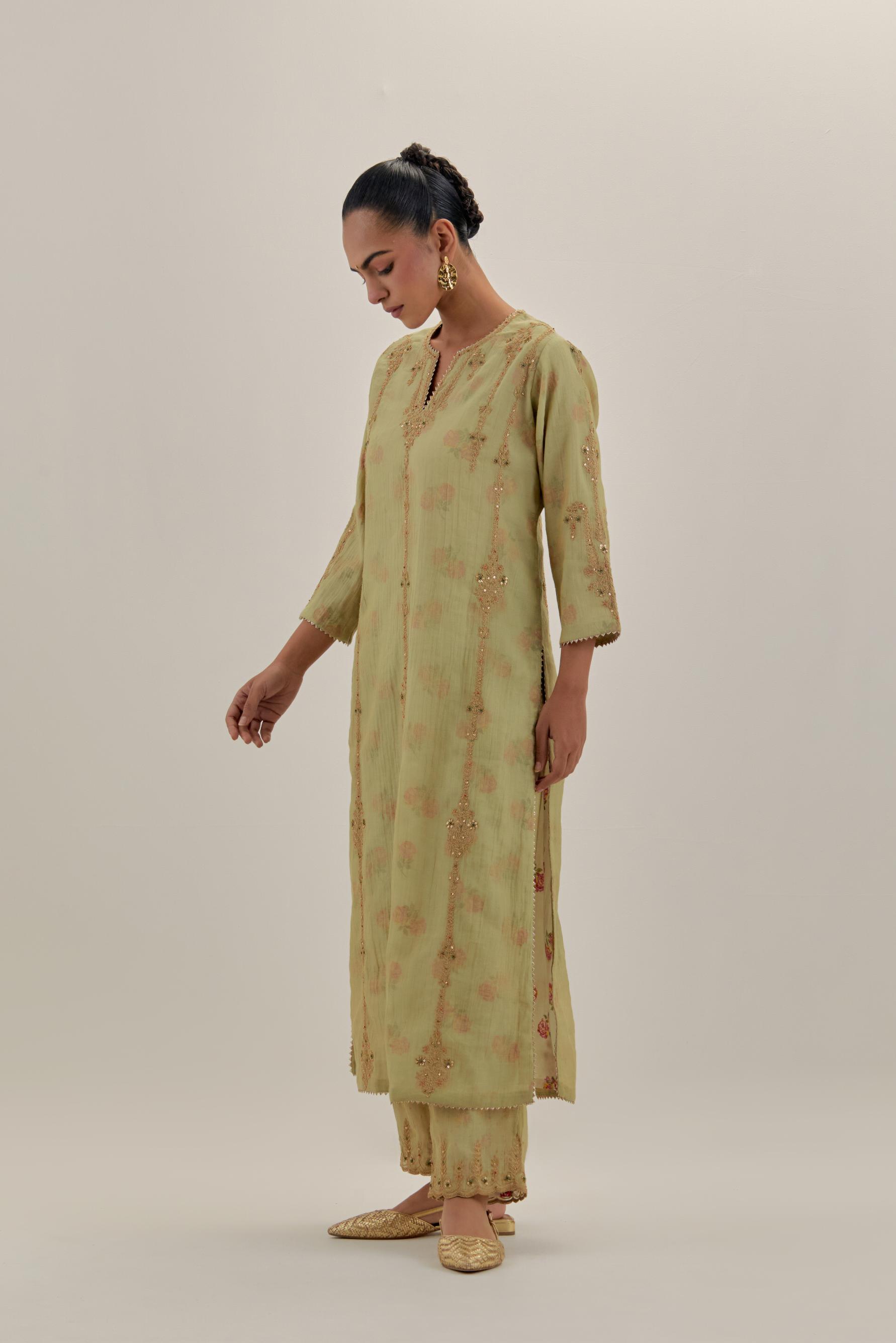 Green tissue chanderi straight kurta set with light gold dori embroidery, highlighted with multi color bead sequins work.