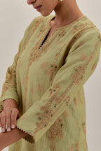 Green tissue chanderi straight kurta set with light gold dori embroidery, highlighted with multi color bead sequins work.