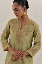 Green tissue chanderi straight kurta set, highlighted with light gold dori embroidery and hand block printed lining inside.
