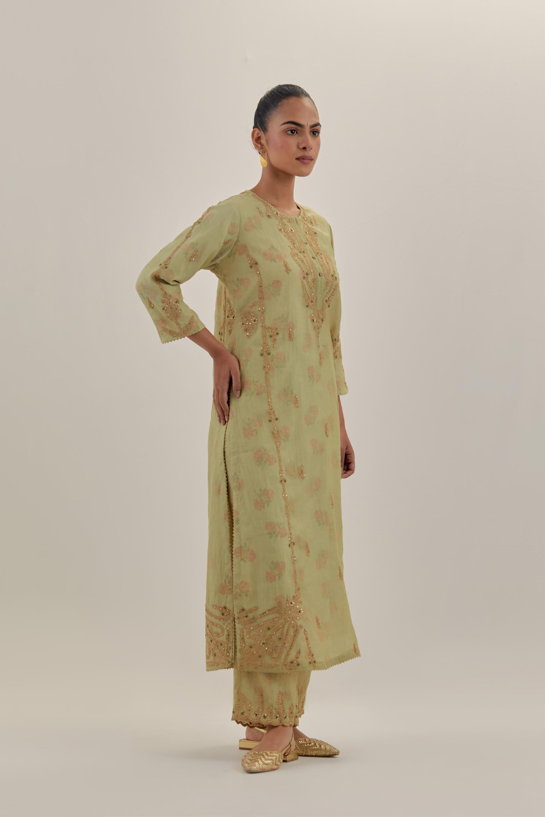 Green tissue chanderi straight kurta set with button placket neckline, highlighted with all-over light gold dori embroidery.