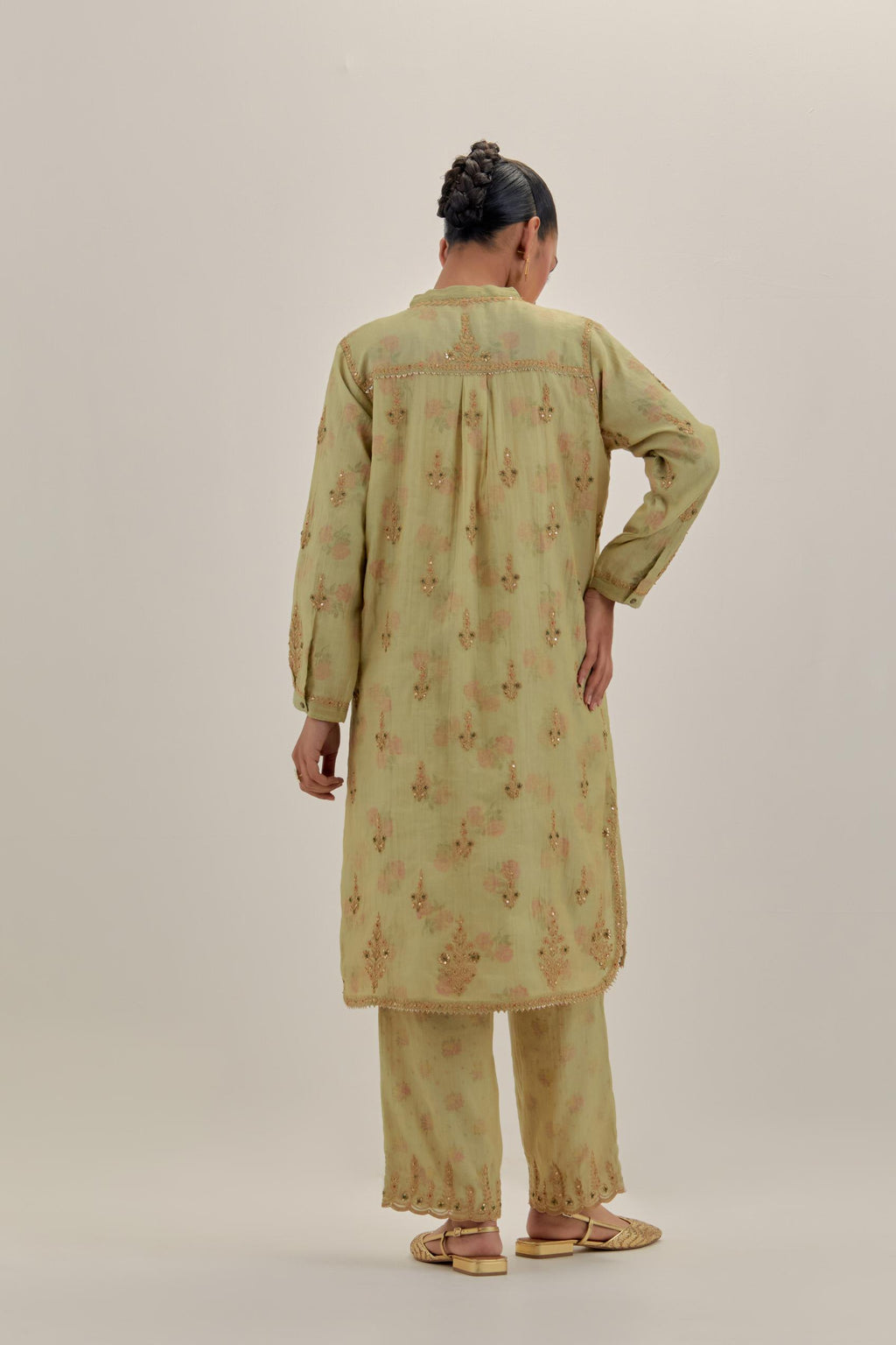 Green tissue chanderi straight short kurta set with all-over light gold dori embroidery.