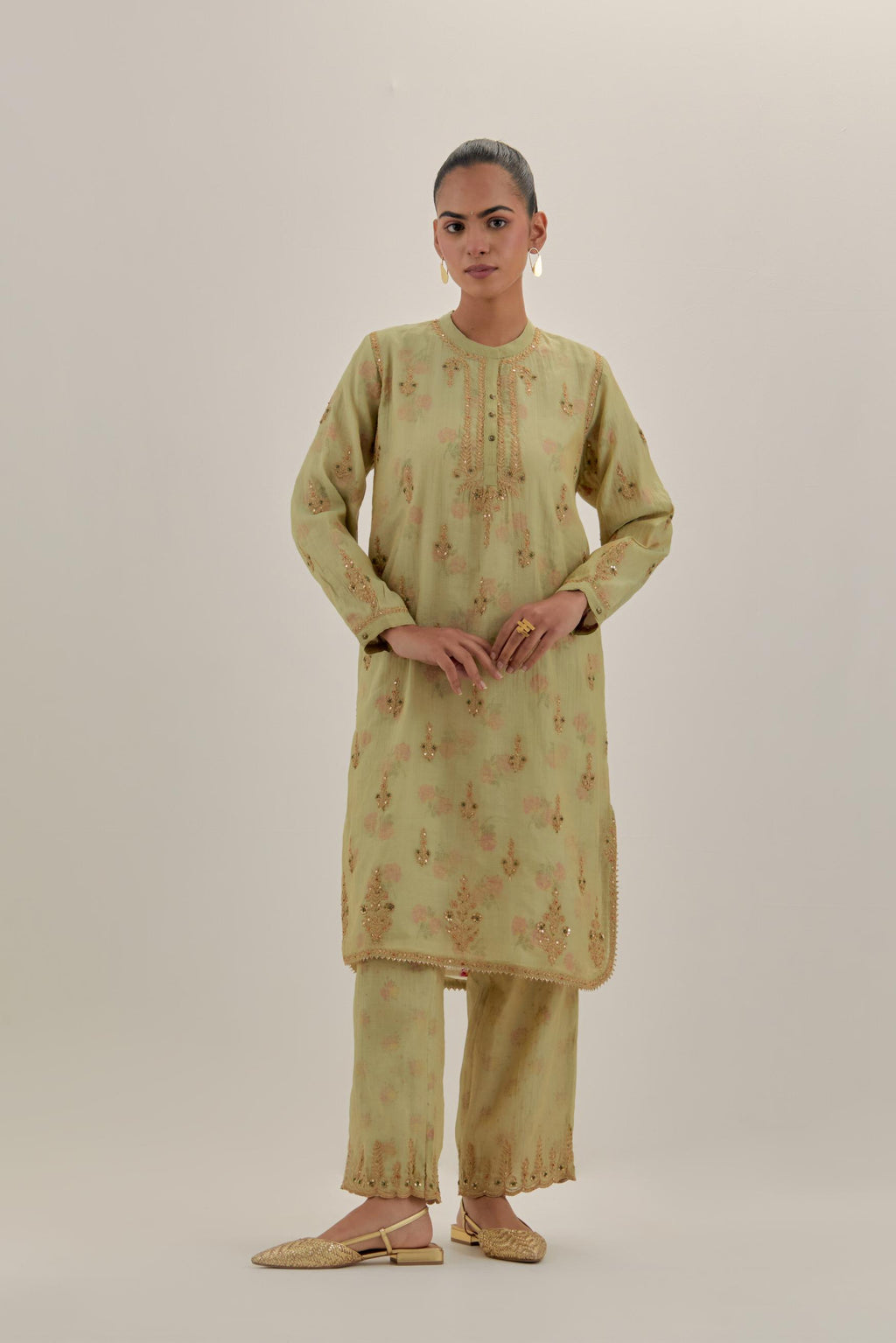 Green tissue chanderi straight short kurta set with all-over light gold dori embroidery.