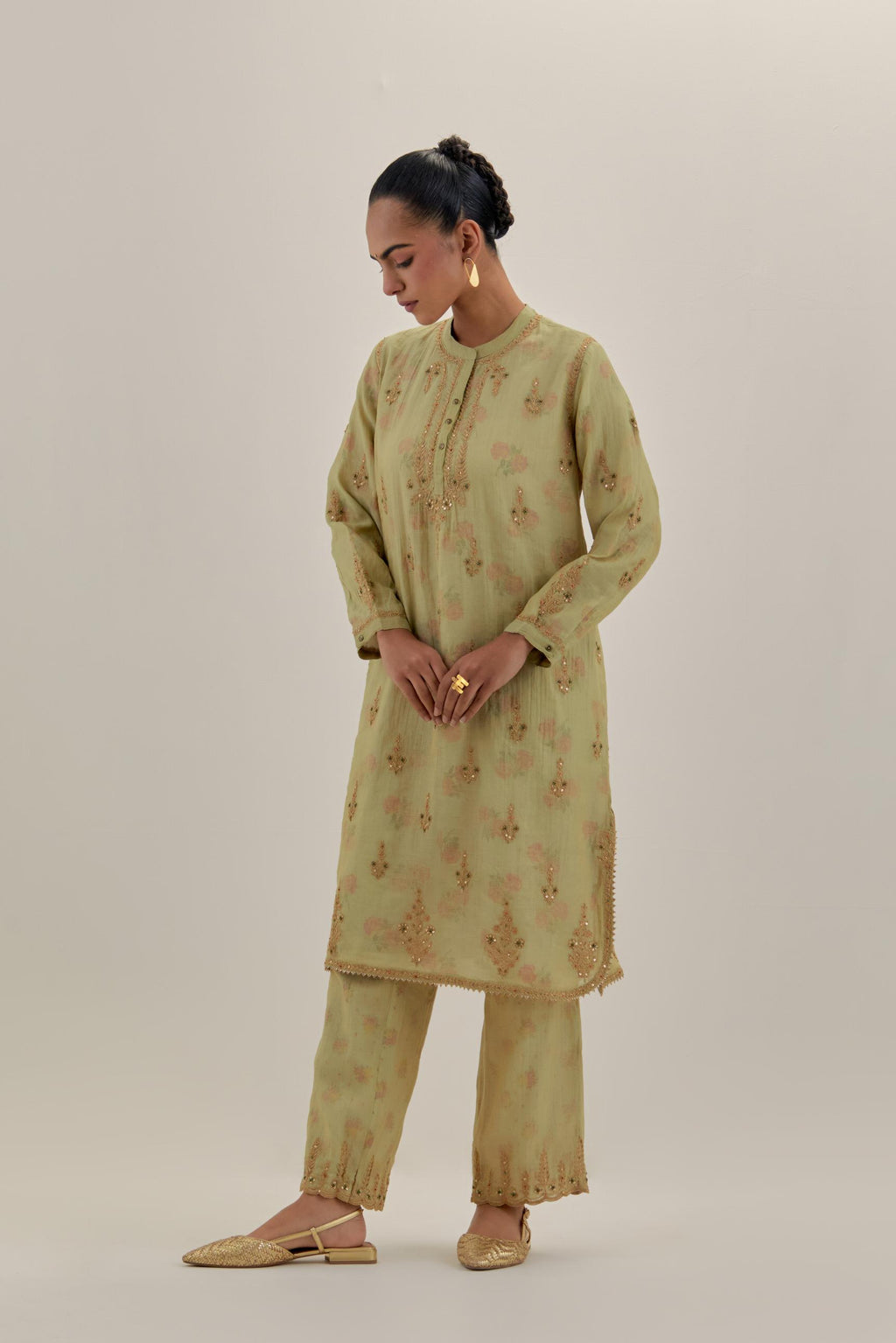 Green tissue chanderi straight short kurta set with all-over light gold dori embroidery.