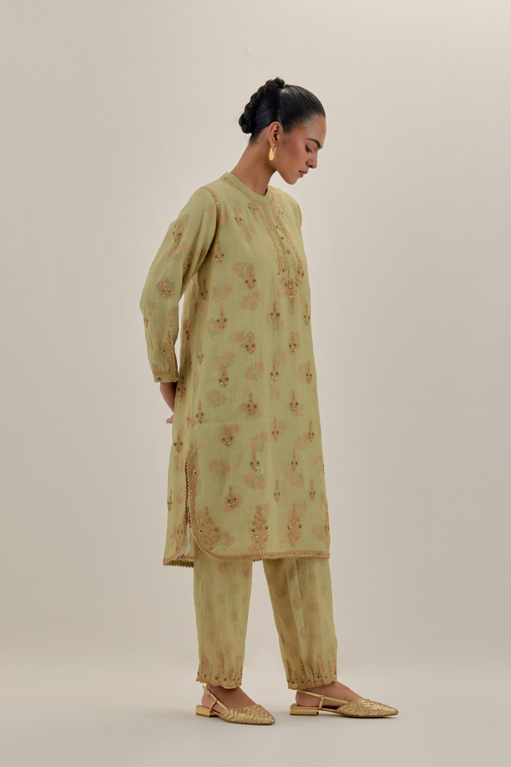 Green tissue chanderi straight short kurta set with all-over light gold dori embroidery.