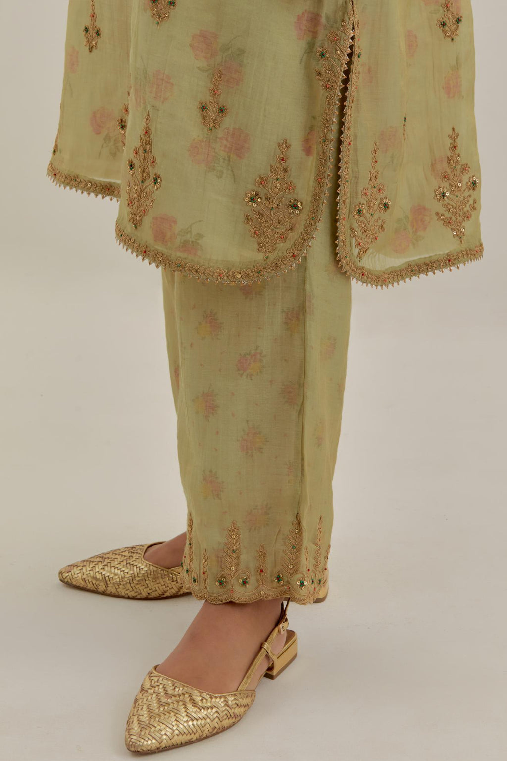 Green tissue chanderi straight short kurta set with all-over light gold dori embroidery.