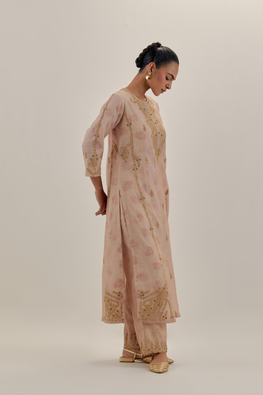 Pink tissue chanderi straight kurta set with button placket neckline, highlighted with all-over light gold dori embroidery.