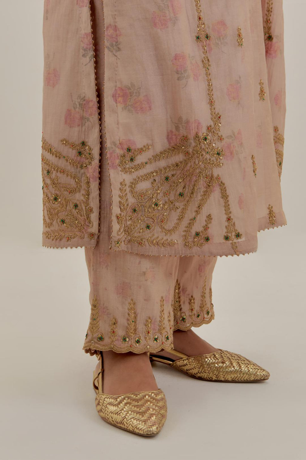 Pink tissue chanderi straight kurta set with button placket neckline, highlighted with all-over light gold dori embroidery.