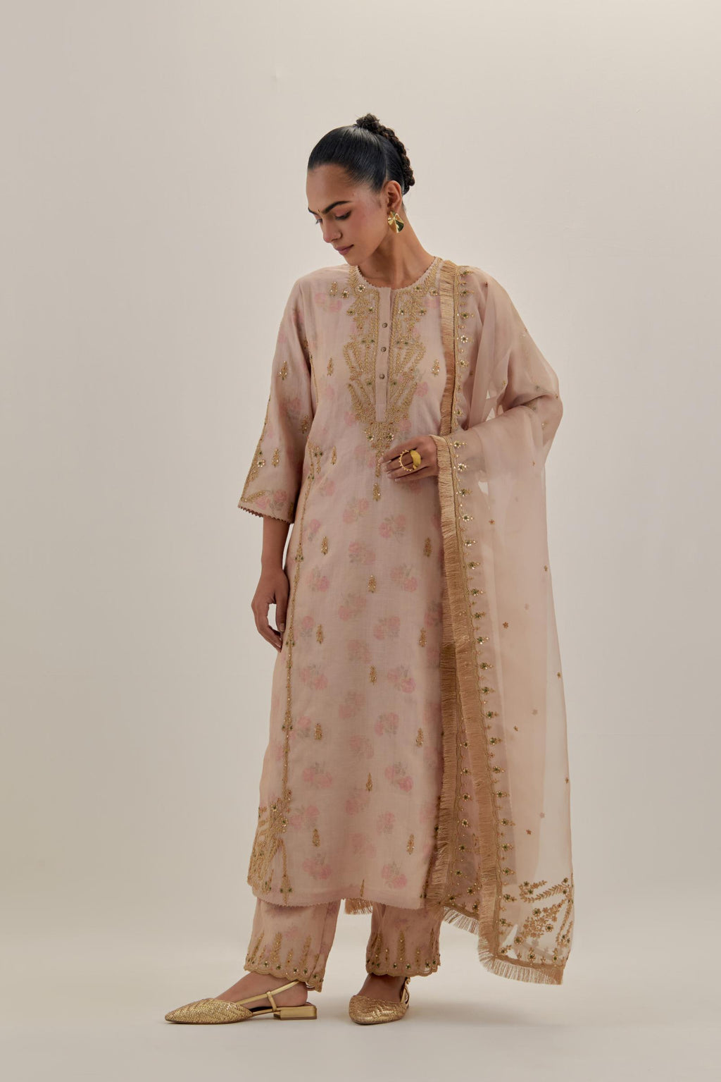 Pink tissue chanderi straight kurta set with button placket neckline, highlighted with all-over light gold dori embroidery.