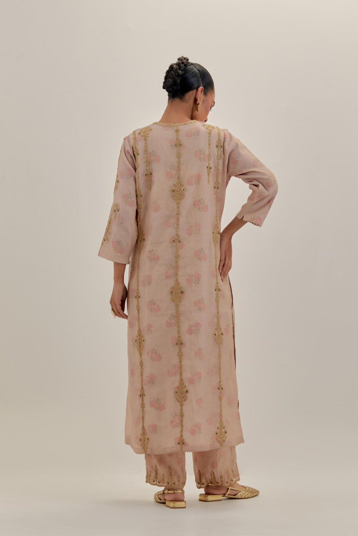 Pink tissue chanderi straight kurta set with light gold dori embroidery, highlighted with multi color bead sequins work.