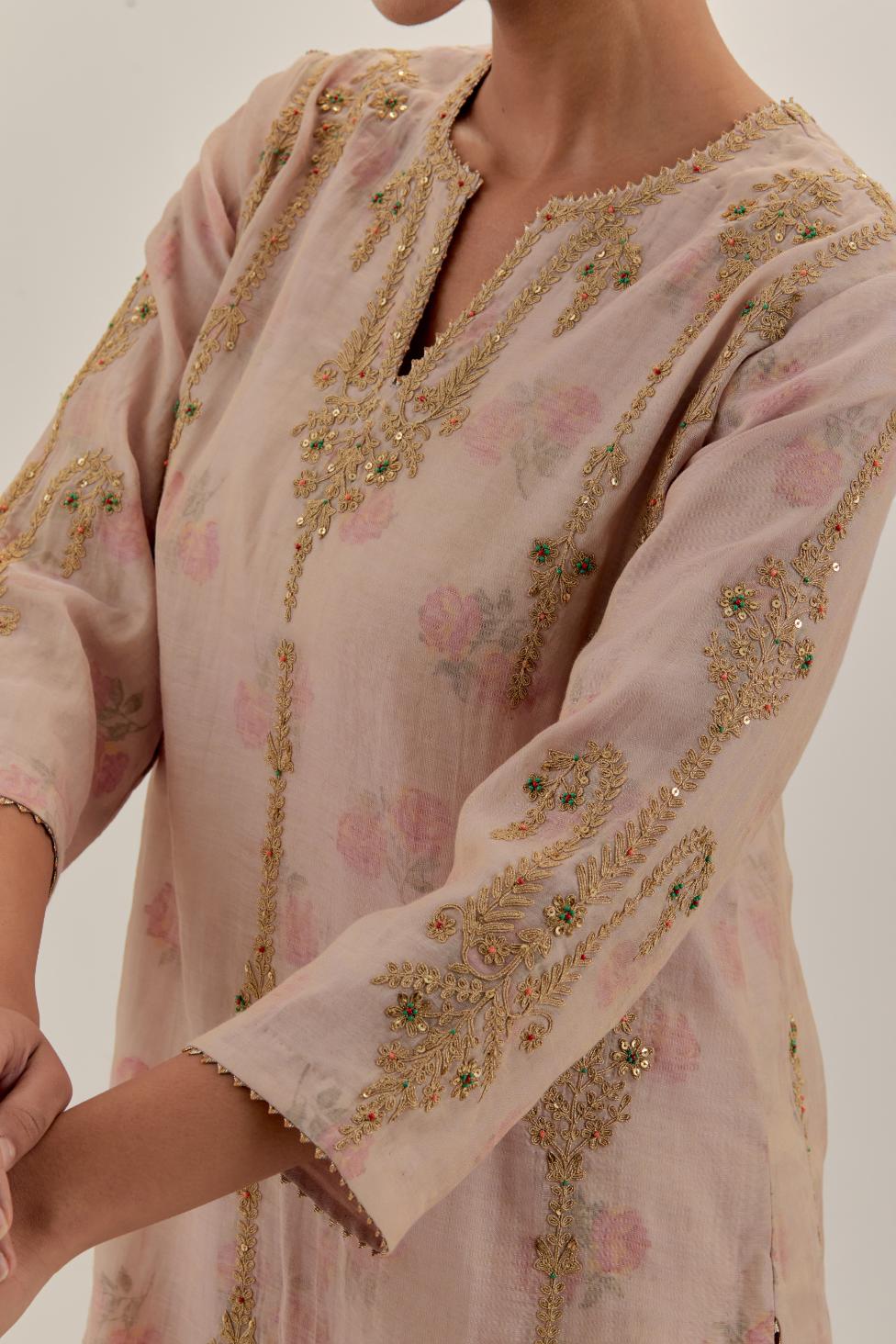 Pink tissue chanderi straight kurta set with light gold dori embroidery, highlighted with multi color bead sequins work.