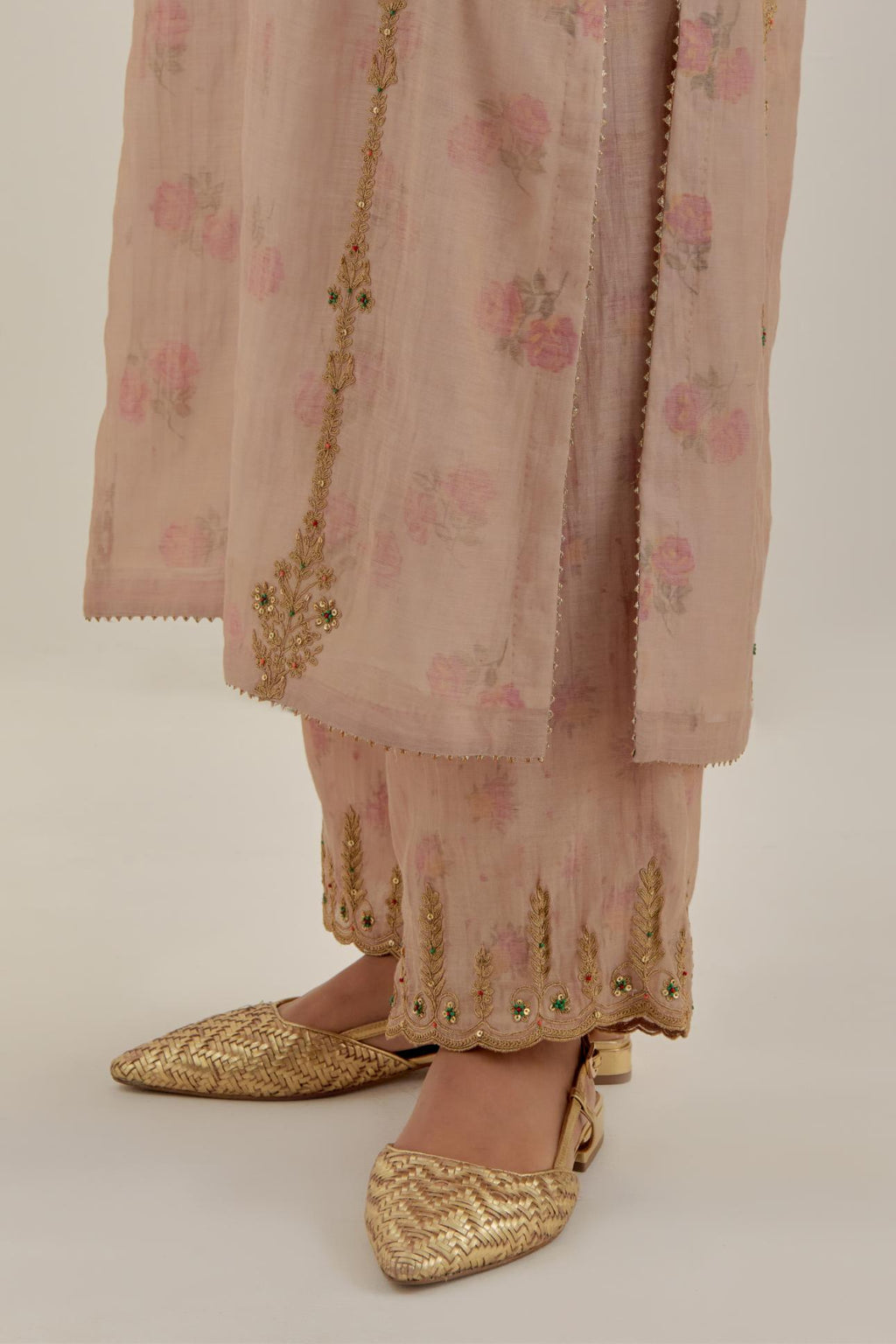 Pink tissue chanderi straight kurta set with light gold dori embroidery, highlighted with multi color bead sequins work.