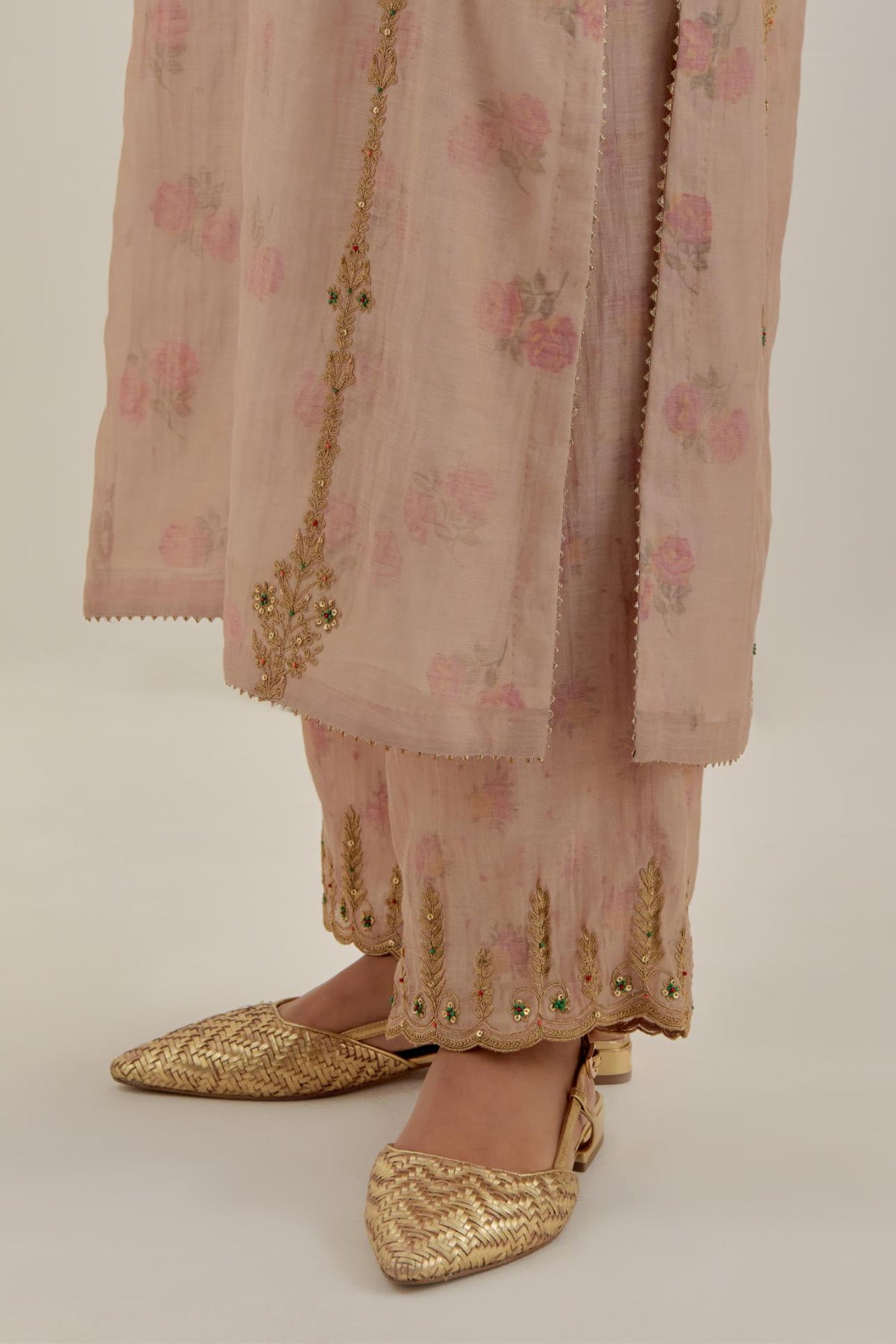 Pink tissue chanderi straight kurta set with light gold dori embroidery, highlighted with multi color bead sequins work.