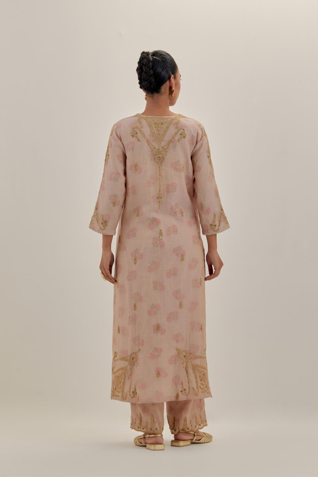 Pink tissue chanderi straight kurta set, highlighted with light gold dori embroidery and hand block printed lining inside.