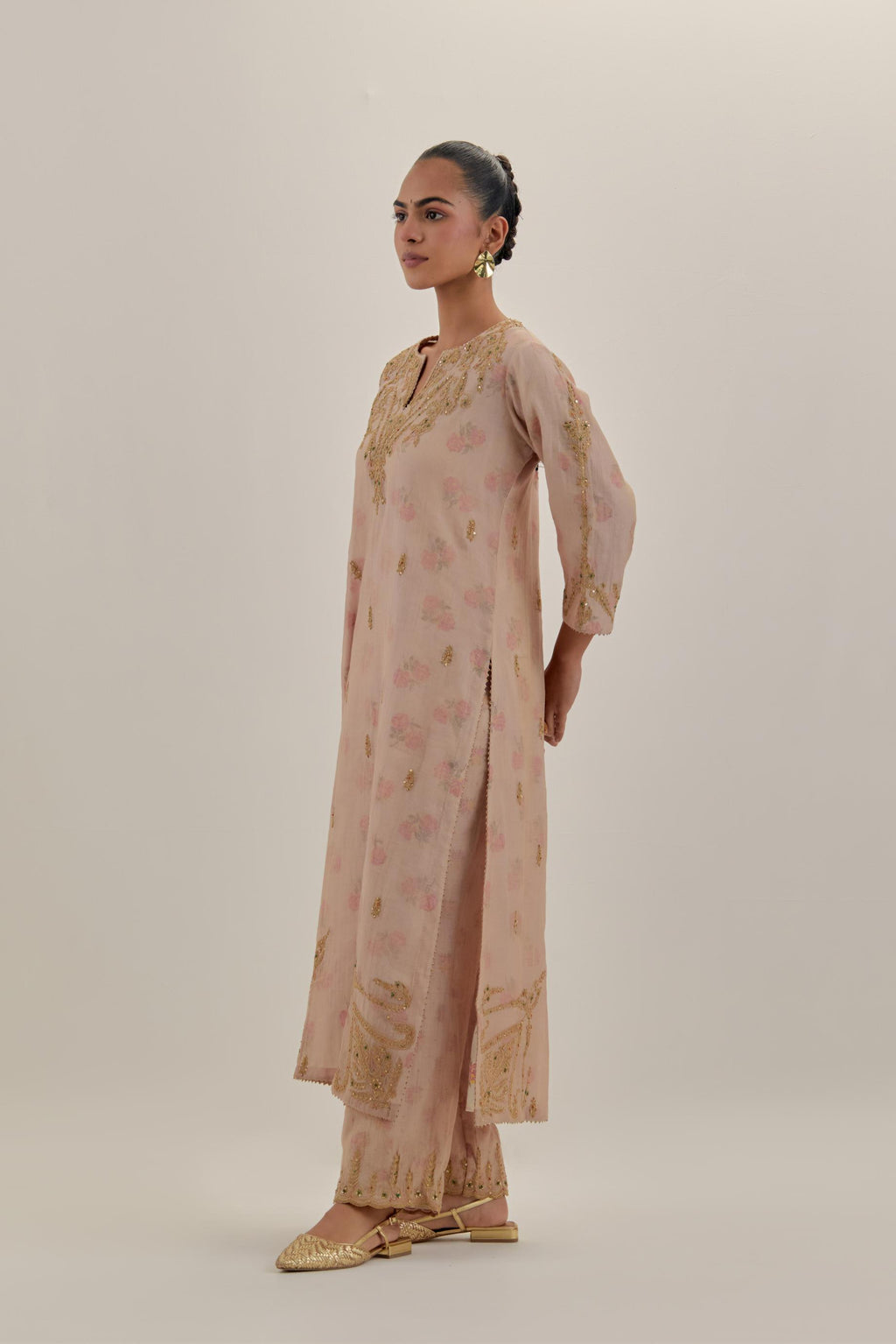 Pink tissue chanderi straight kurta set, highlighted with light gold dori embroidery and hand block printed lining inside.