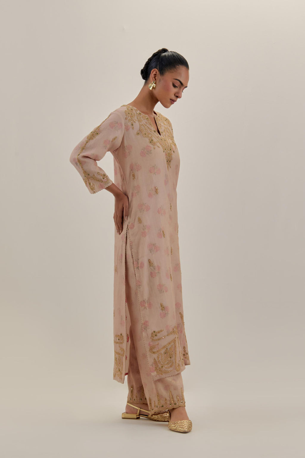 Pink tissue chanderi straight kurta set, highlighted with light gold dori embroidery and hand block printed lining inside.