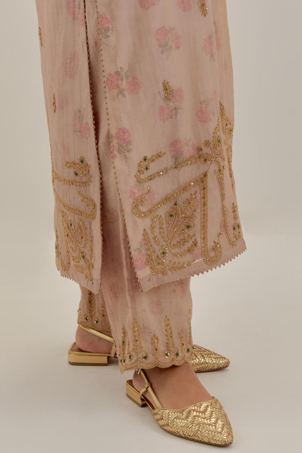 Pink tissue chanderi straight kurta set, highlighted with light gold dori embroidery and hand block printed lining inside.