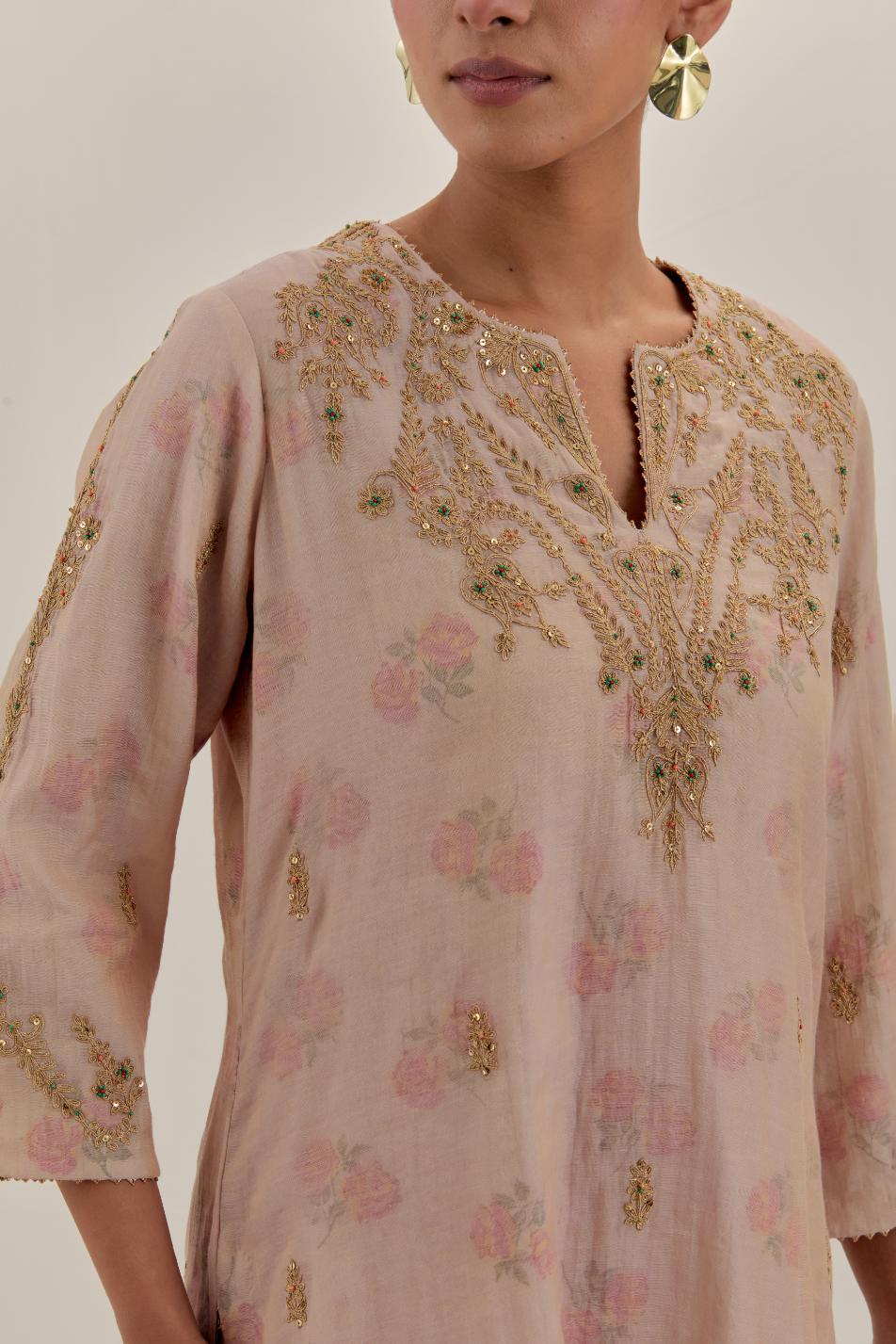 Pink tissue chanderi straight kurta set, highlighted with light gold dori embroidery and hand block printed lining inside.