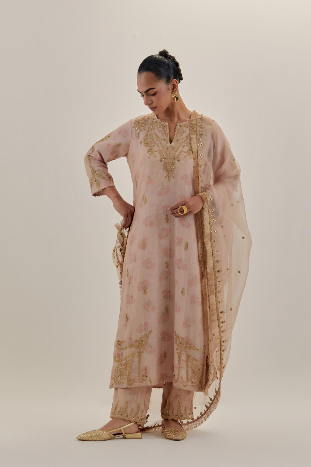 Pink tissue chanderi straight kurta set, highlighted with light gold dori embroidery and hand block printed lining inside.