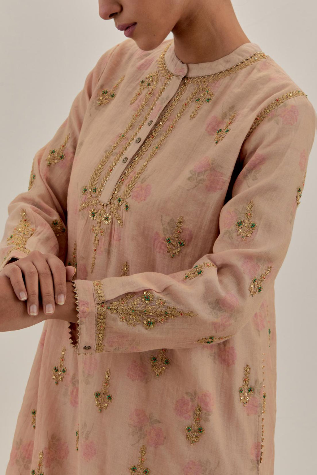 Pink tissue chanderi straight short kurta set with all-over light gold dori embroidery.