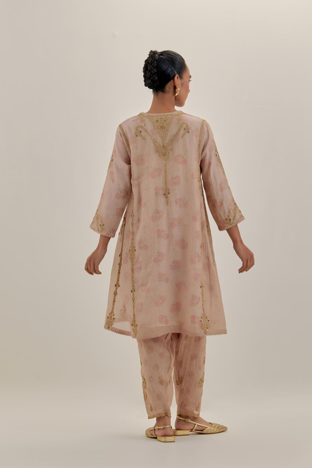 Pink tissue chanderi easy fit short kalidar kurta set with light gold dori embroidery and hand block printed lining inside.