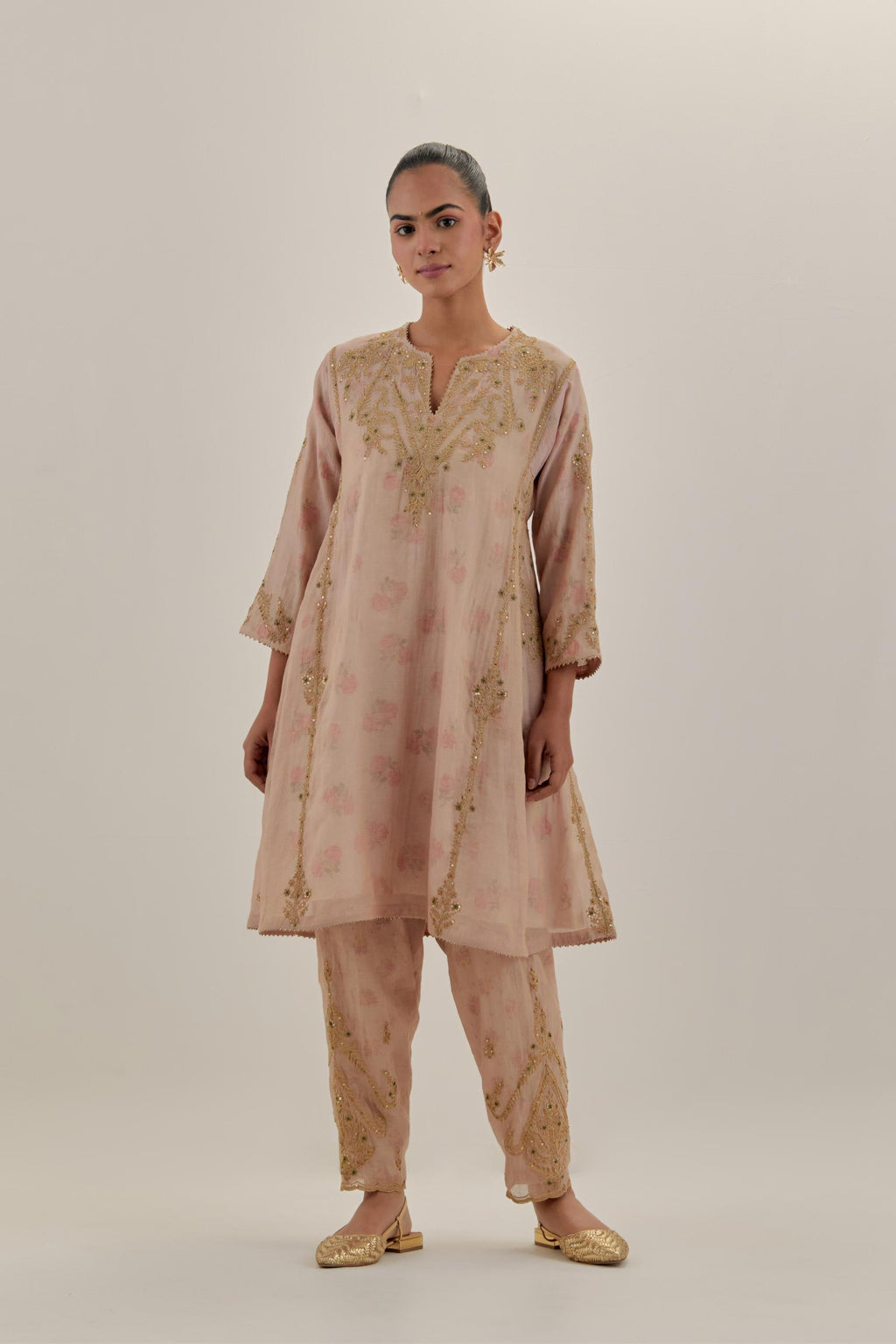 Pink tissue chanderi easy fit short kalidar kurta set with light gold dori embroidery and hand block printed lining inside.