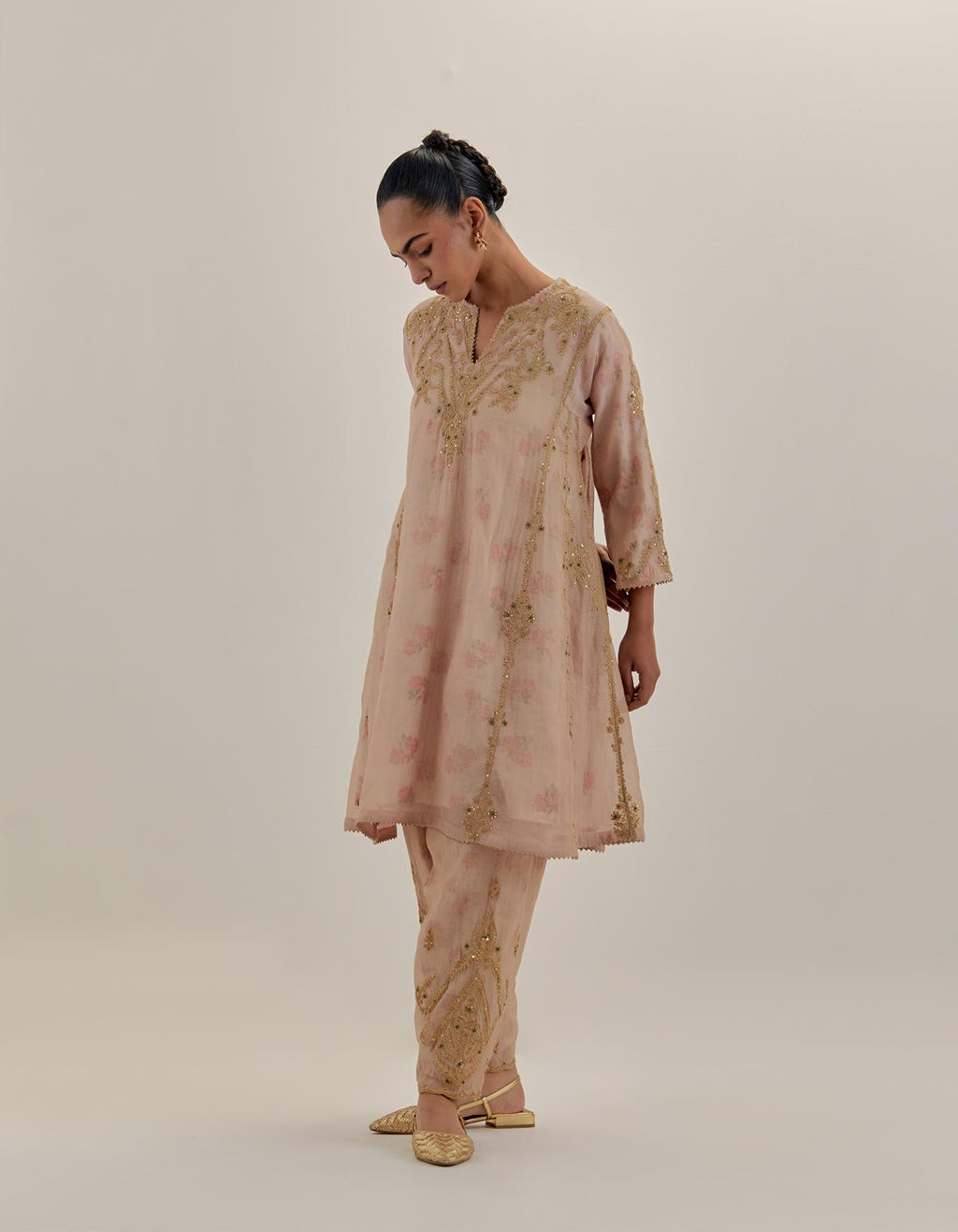 Pink tissue chanderi easy fit short kalidar kurta set with light gold dori embroidery and hand block printed lining inside.