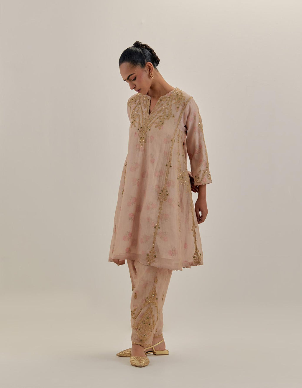 Pink tissue chanderi easy fit short kalidar kurta set with light gold dori embroidery and hand block printed lining inside.