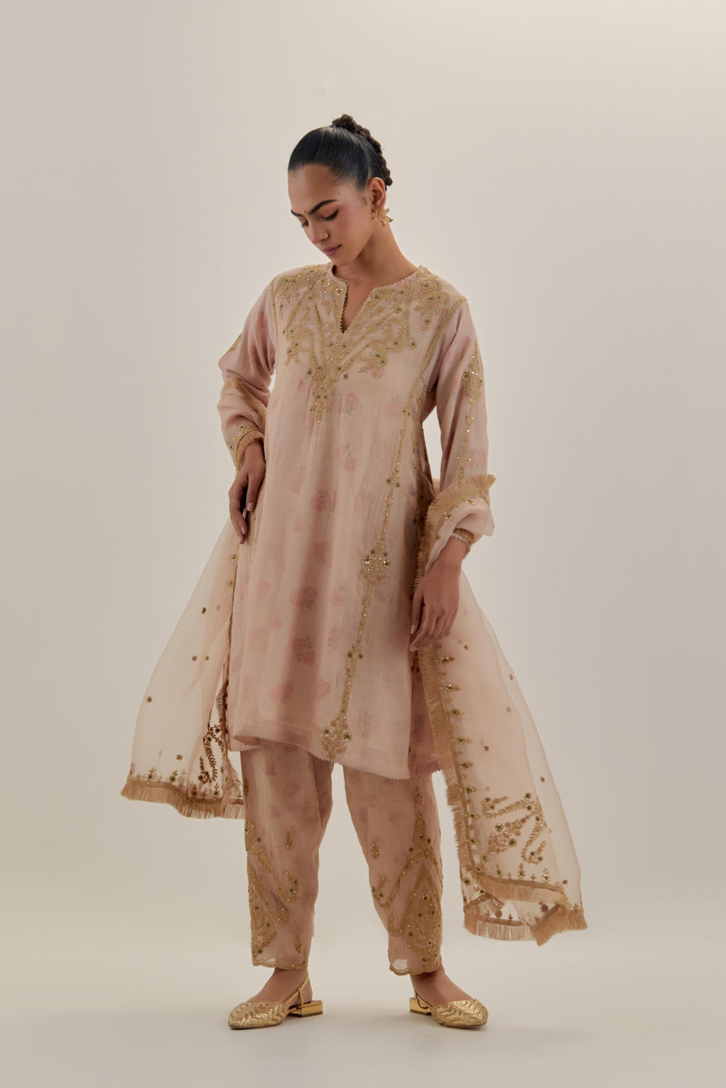 Pink tissue chanderi easy fit short kalidar kurta set with light gold dori embroidery and hand block printed lining inside.