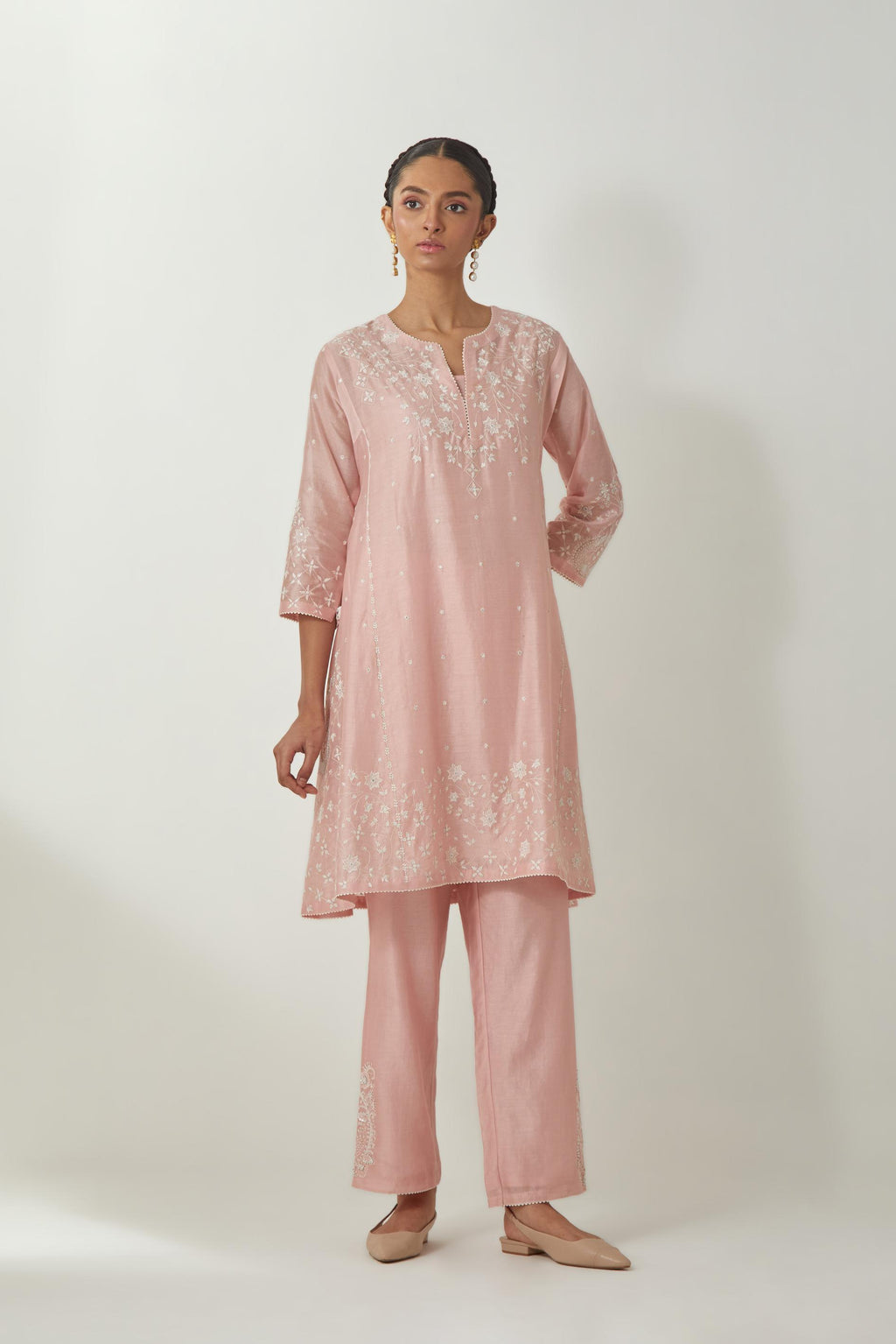 Pink silk Chanderi short kalidar kurta set with all-over off white silk thread embroidery, highlighted with beads and sequins work.