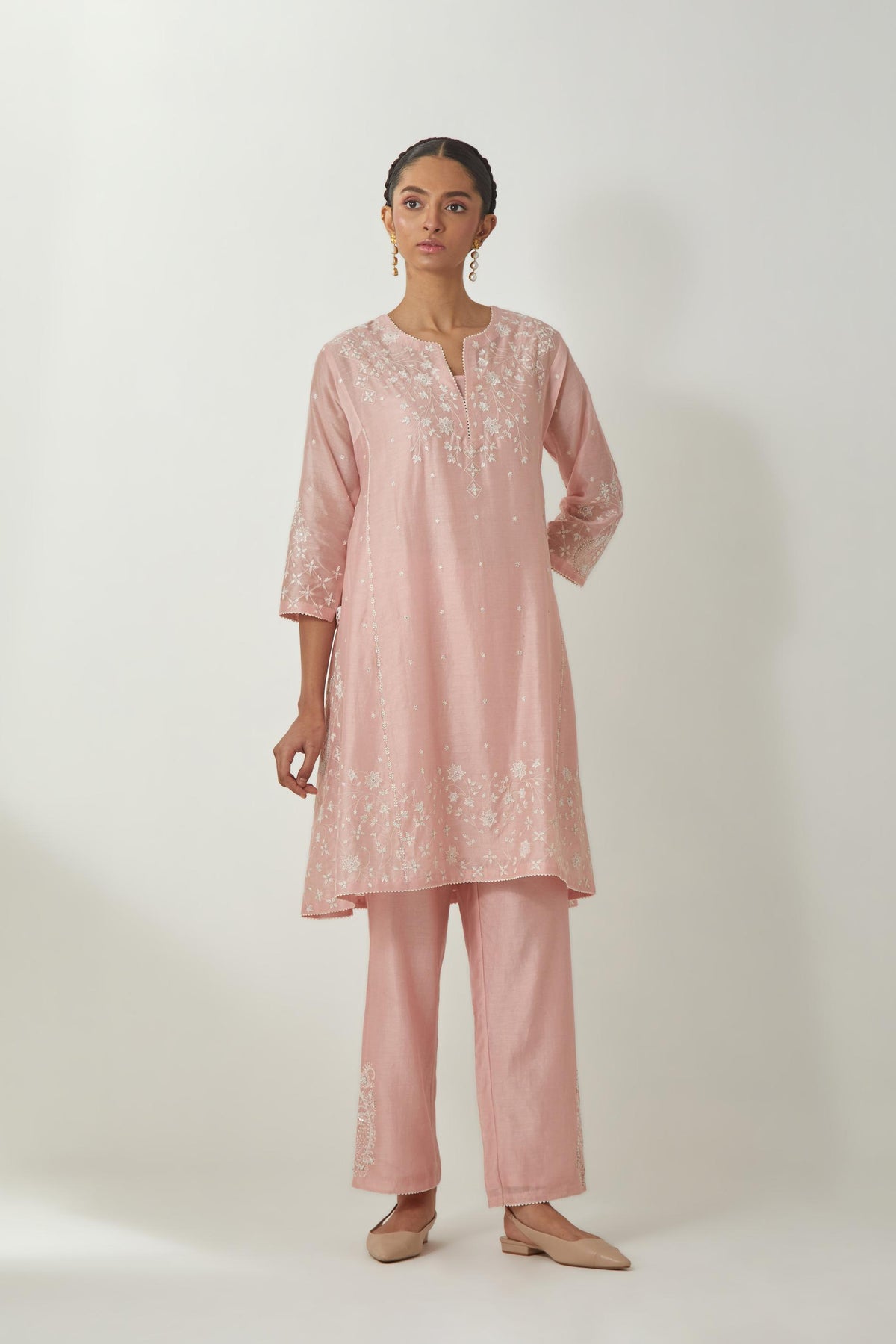 Pink silk Chanderi short kalidar kurta set with all-over off white silk thread embroidery, highlighted with beads and sequins work.