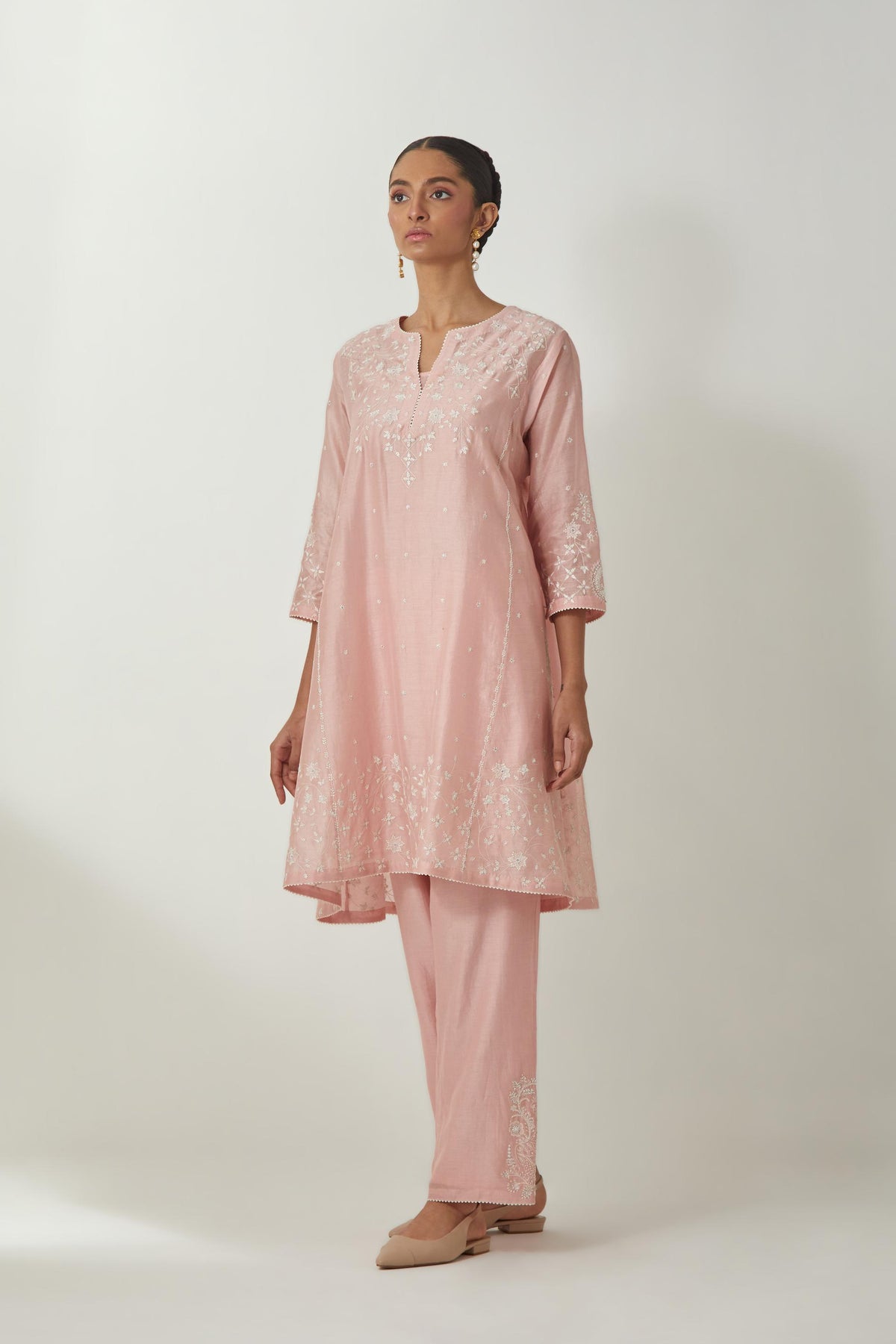 Pink silk Chanderi short kalidar kurta set with all-over off white silk thread embroidery, highlighted with beads and sequins work.