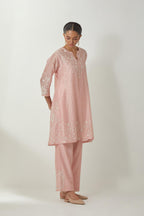 Pink silk Chanderi short kalidar kurta set with all-over off white silk thread embroidery, highlighted with beads and sequins work.