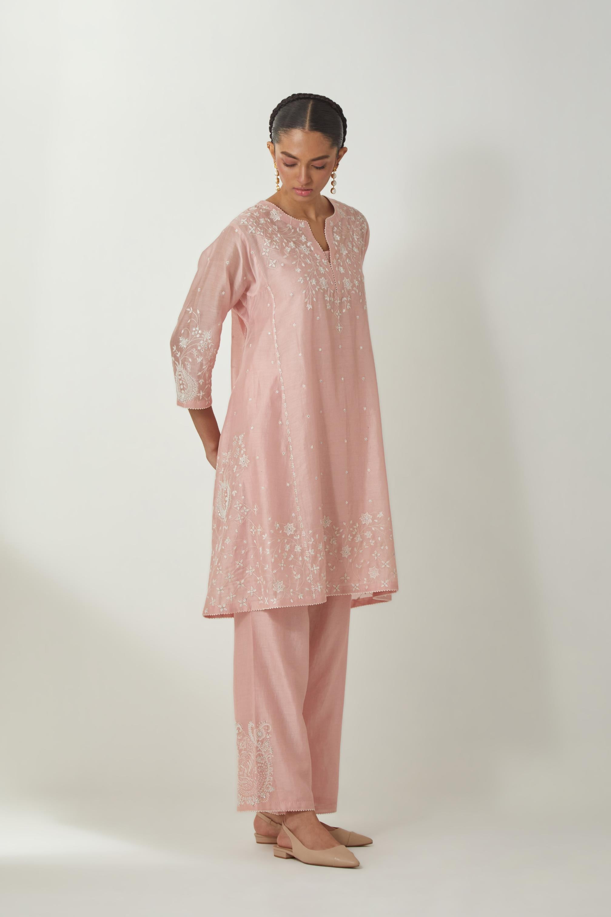 Pink silk Chanderi short kalidar kurta set with all-over off white silk thread embroidery, highlighted with beads and sequins work.