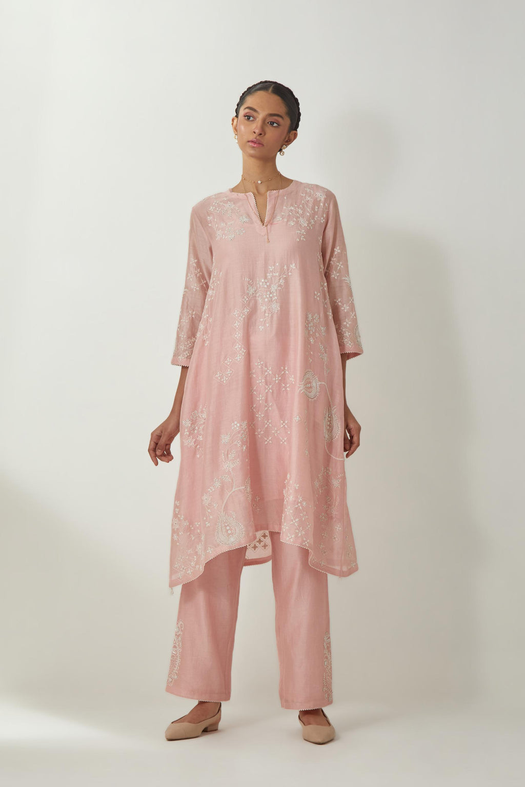 Pink silk Chanderi short easy fit kurta set with straight hem and all-over off white silk thread embroidery, highlighted with beads and sequins work.
