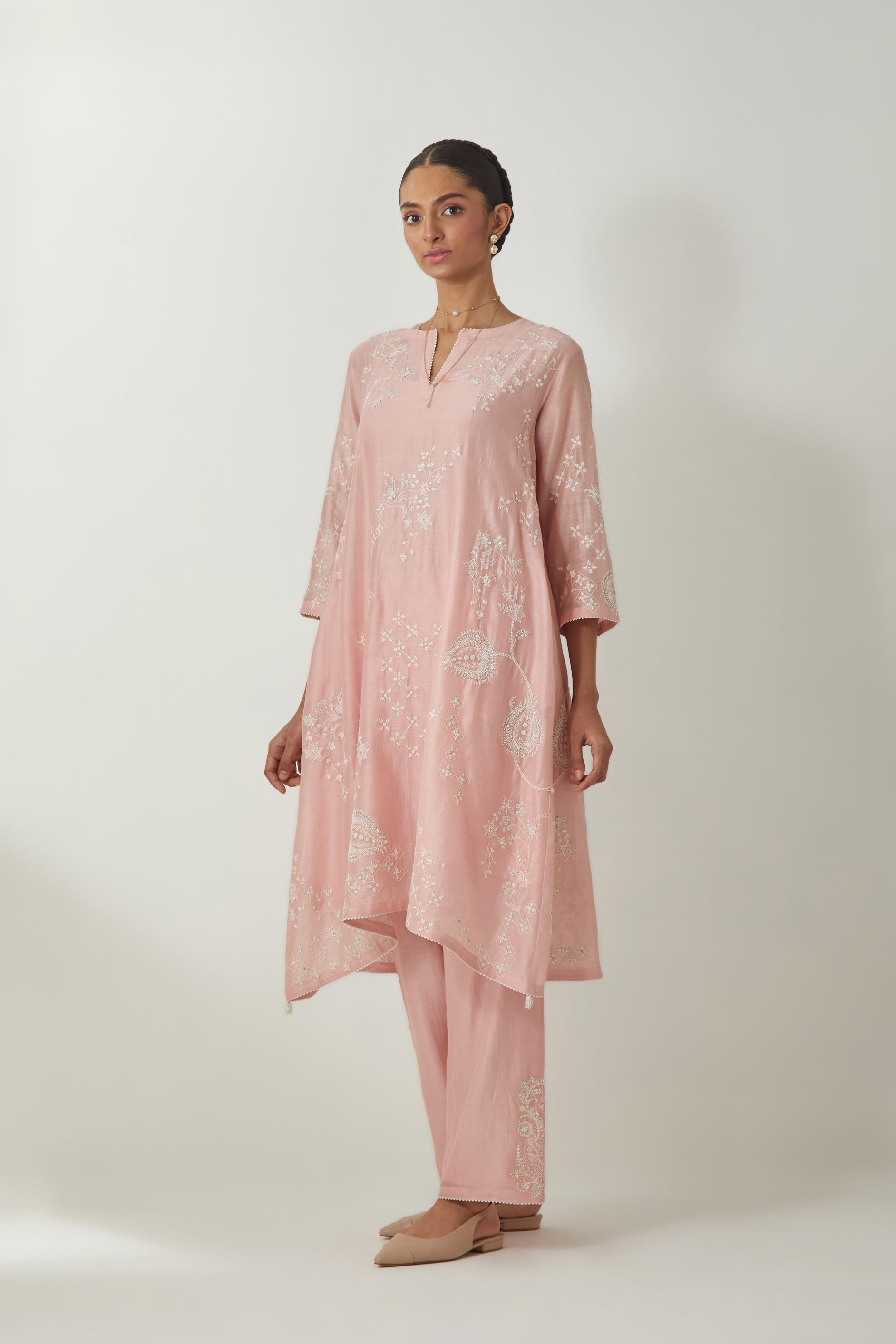 Pink silk Chanderi short easy fit kurta set with straight hem and all-over off white silk thread embroidery, highlighted with beads and sequins work.