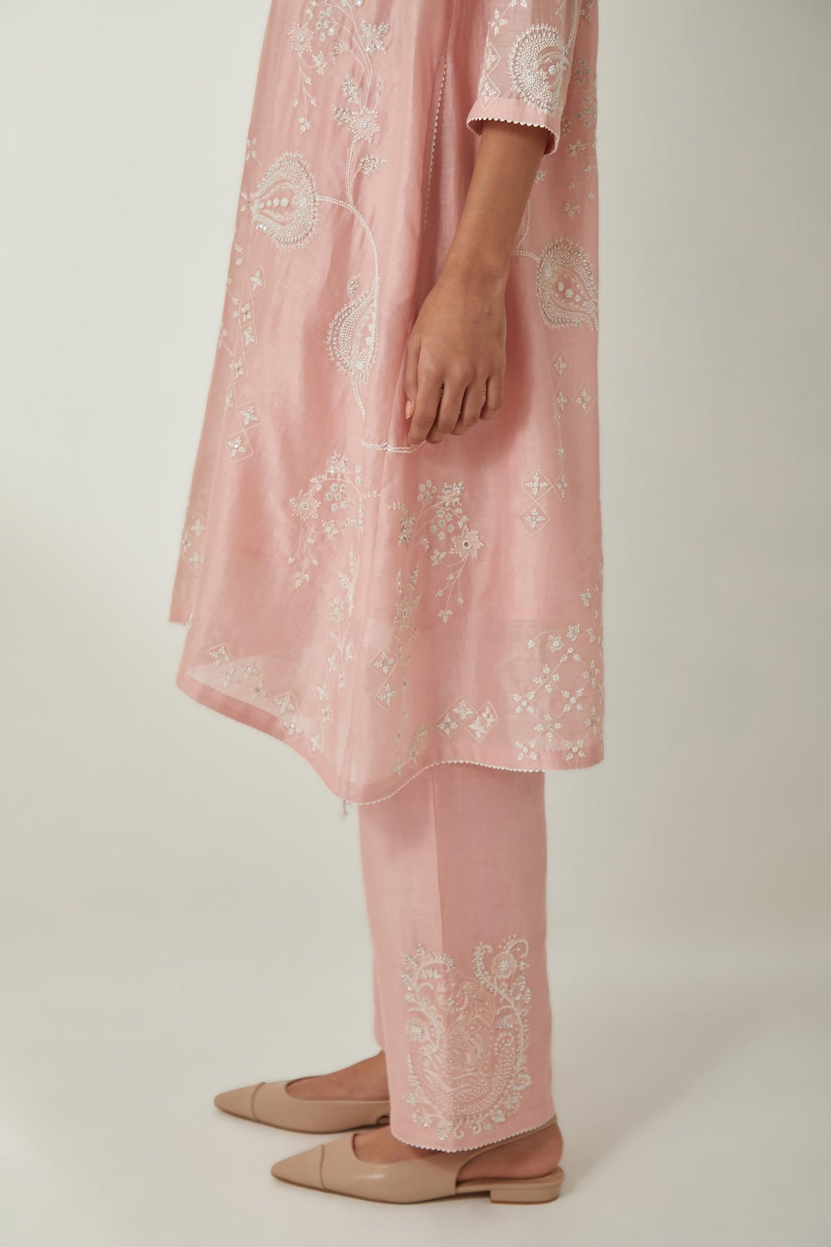 Pink silk Chanderi short easy fit kurta set with straight hem and all-over off white silk thread embroidery, highlighted with beads and sequins work.