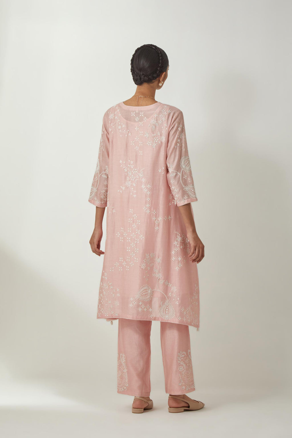 Pink silk Chanderi short easy fit kurta set with straight hem and all-over off white silk thread embroidery, highlighted with beads and sequins work.