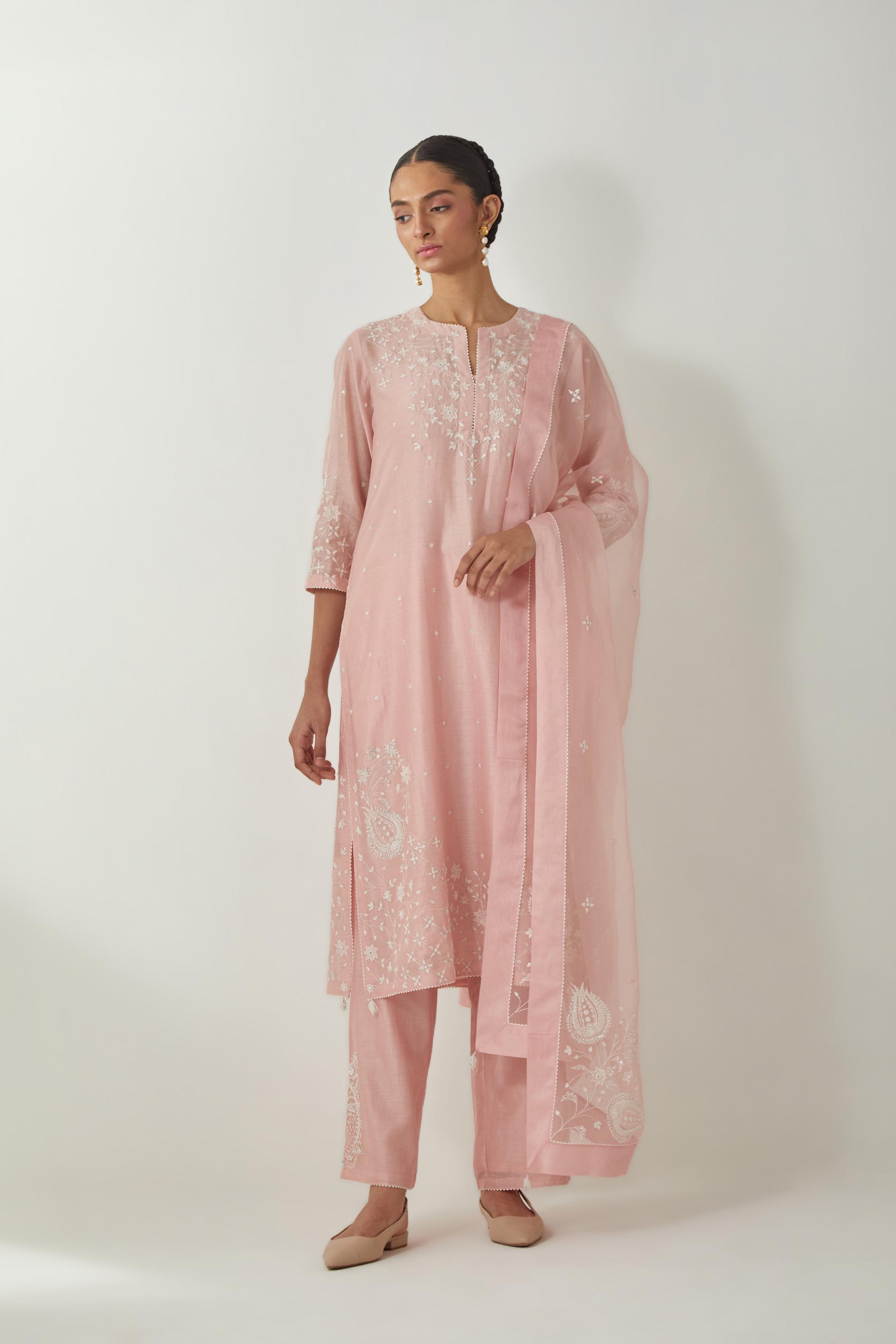 Pink silk Chanderi straight mid length kurta set with all-over off white silk thread embroidery, highlighted with beads, and sequins work at neck & hem.