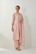 Pink silk Chanderi straight mid length kurta set with all-over off white silk thread embroidery, highlighted with beads, and sequins work at neck & hem.