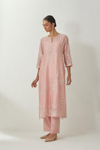 Pink silk Chanderi straight kurta set with all-over off white silk thread embroidery, highlighted with beads and sequins work.