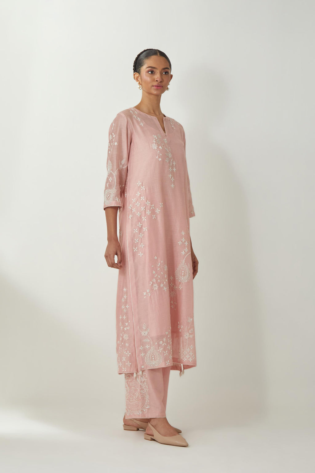 Pink silk Chanderi straight kurta set with all-over off white silk thread embroidery, highlighted with beads and sequins work.