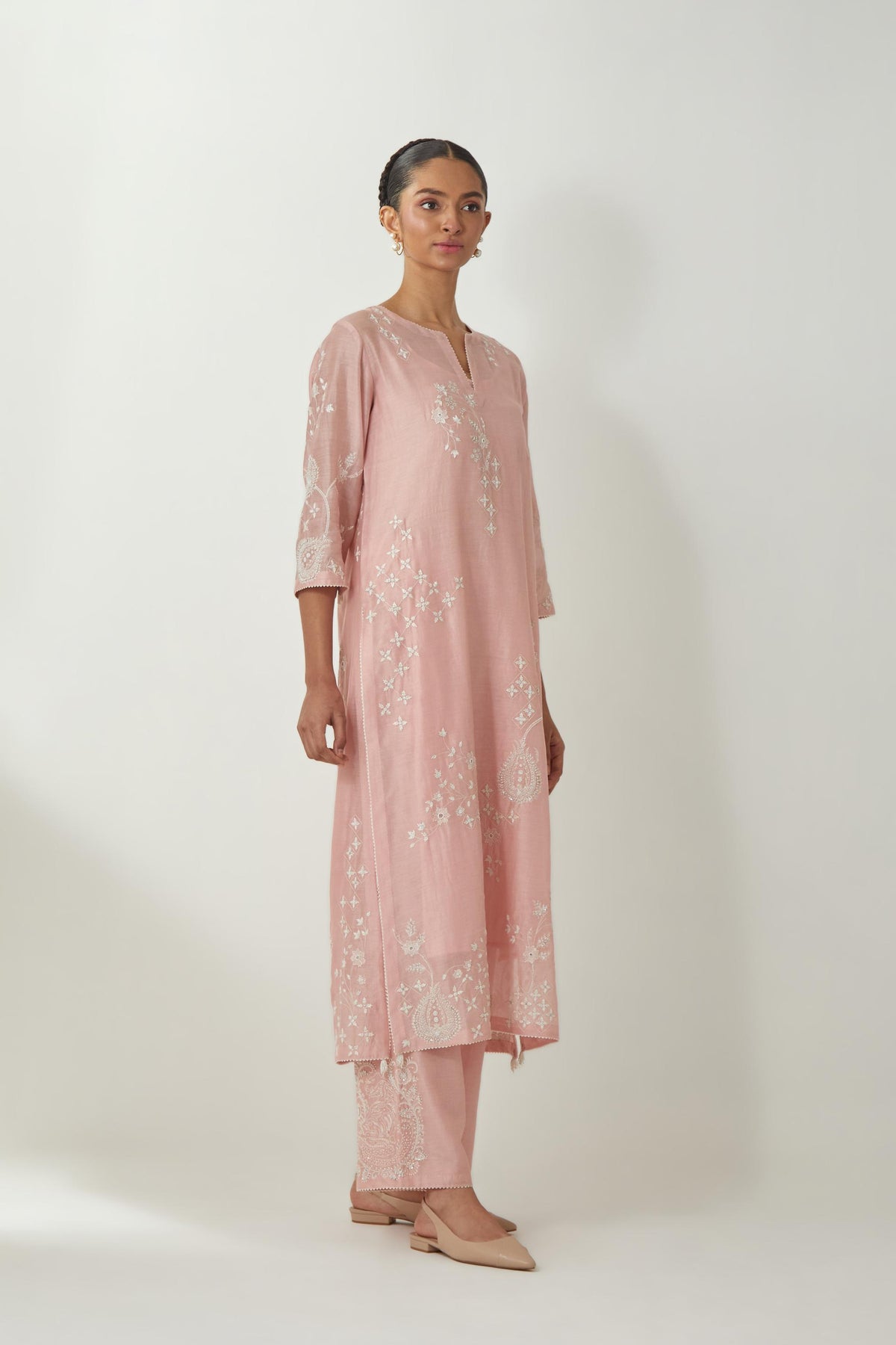 Pink silk Chanderi straight kurta set with all-over off white silk thread embroidery, highlighted with beads and sequins work.