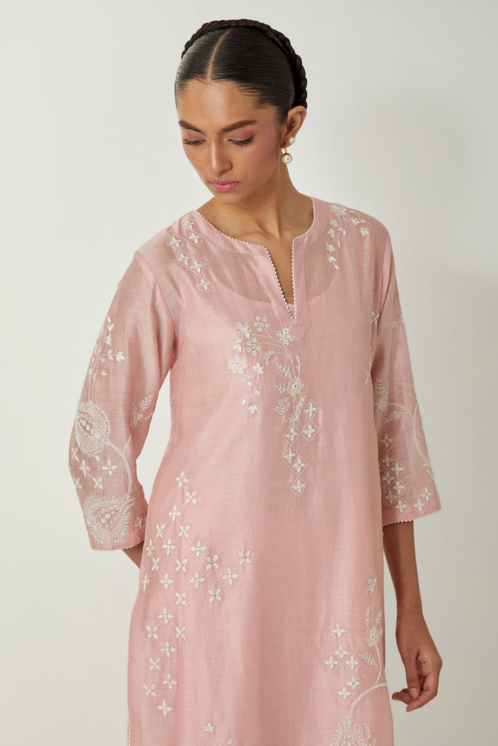 Pink silk Chanderi straight kurta set with all-over off white silk thread embroidery, highlighted with beads and sequins work.
