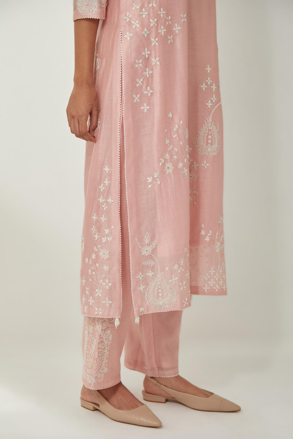 Pink silk Chanderi straight kurta set with all-over off white silk thread embroidery, highlighted with beads and sequins work.