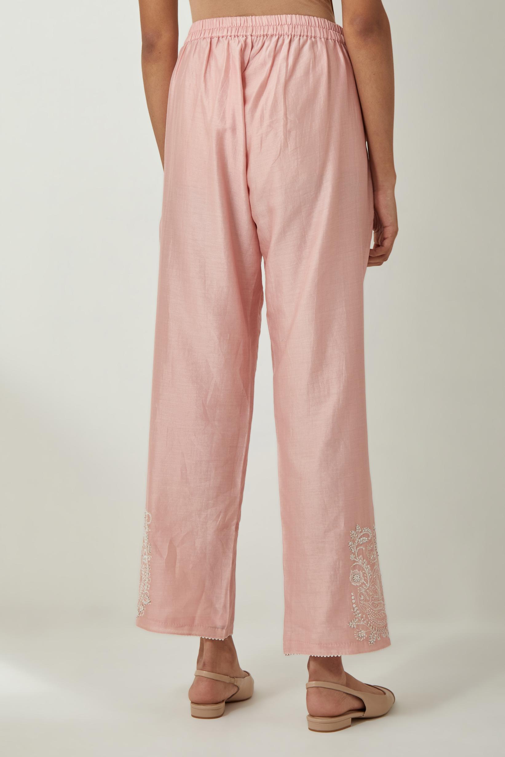 Pink silk Chanderi straight pants with embroidered boota at sides, highlighted with sequins and beads.
