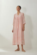 Pink silk Chanderi easy fit dress with all-over off white silk thread embroidery, highlighted with beads and sequins work.